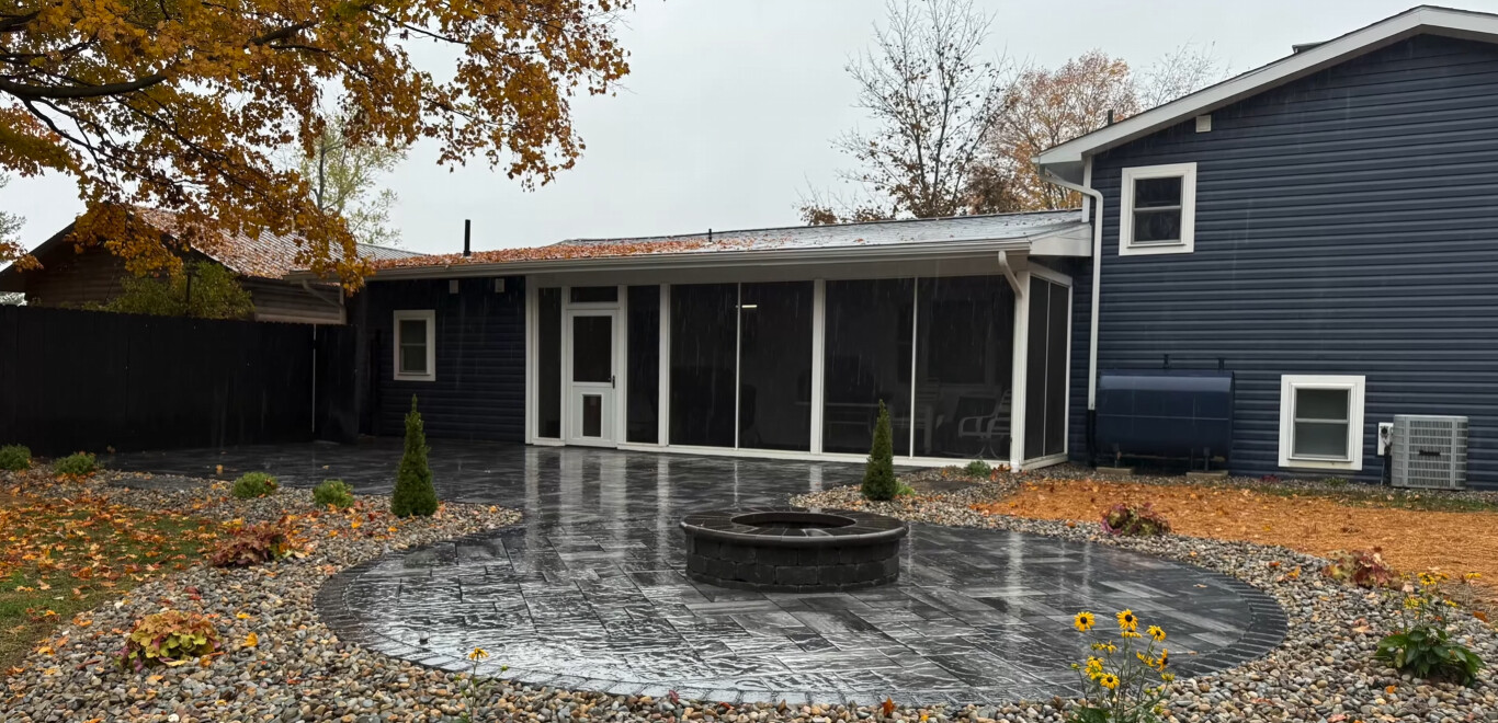 Stamped decorative concrete patio with firepit in Gary, IN